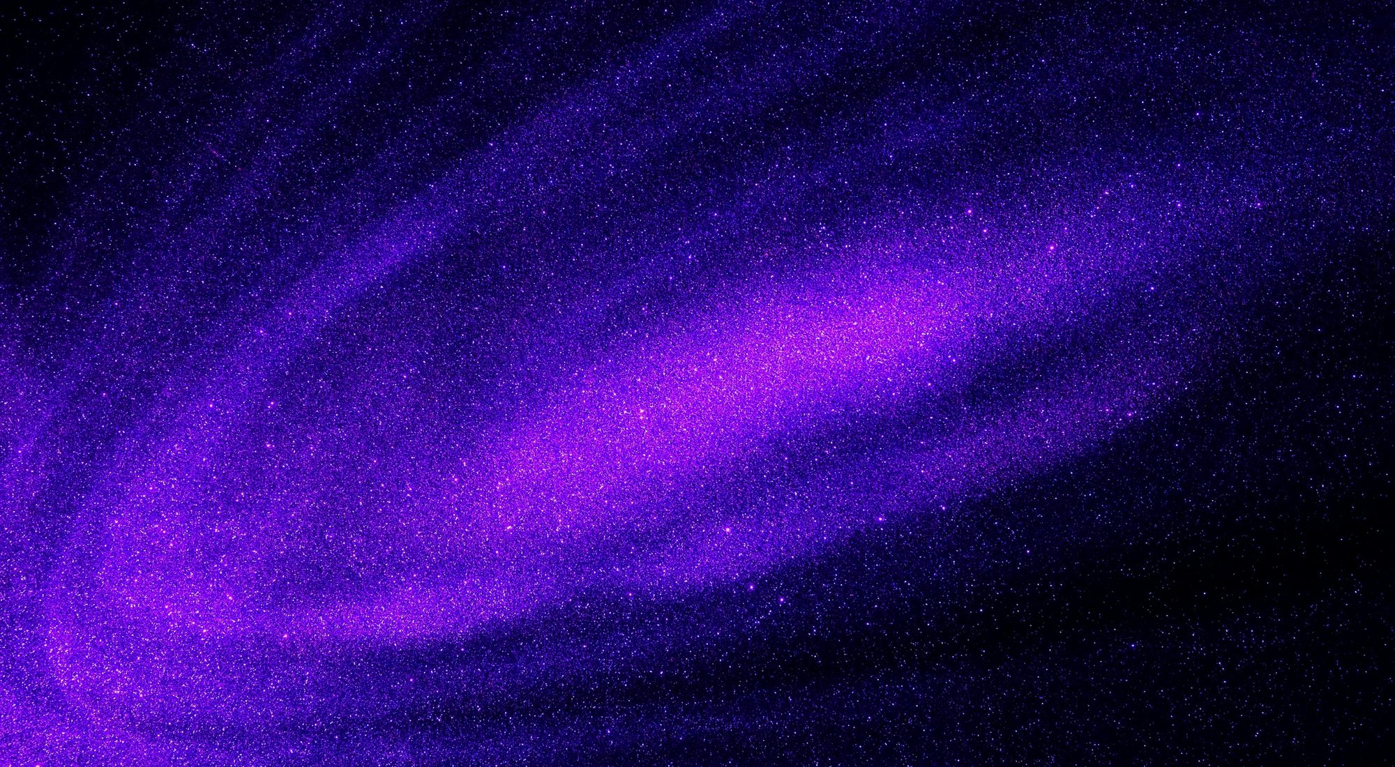 A sweeping violet and indigo aurora of cosmic dust drifting across a deep, starlit night sky